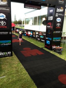 Amelia crossing finish line